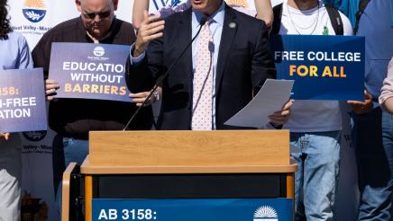 Asm. Berman speaking on the podium