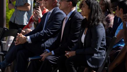 Asm. Berman listening to speakers at the presser