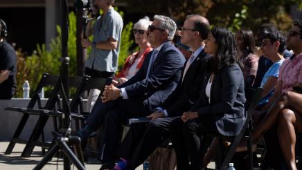 Asm. Berman listening to speakers at the presser