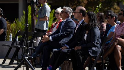 Asm. Berman listening to speakers at the presser