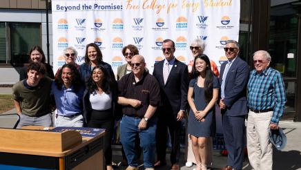 Group photo of Asm. Berman with students and attendees